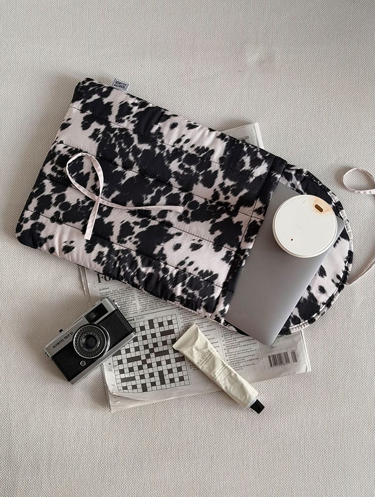 Cow Print Quilted Bow Laptop Sleeve Laptop Cases Skinnydip London