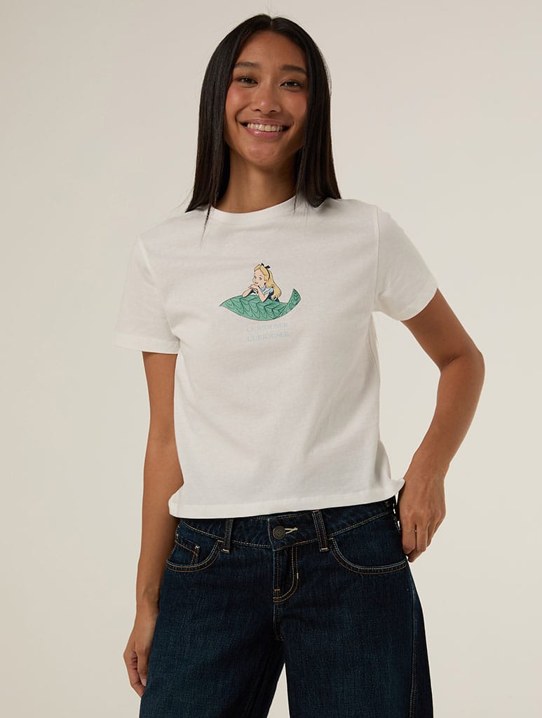 Disney Alice In Wonderland Curiouser and Curiouser Baby T-Shirt In White Tops & T-Shirts Skinnydip London