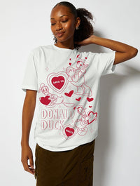 Disney Donald Duck Love T-Shirt in Ecru Tops & T-Shirts Skinnydip London