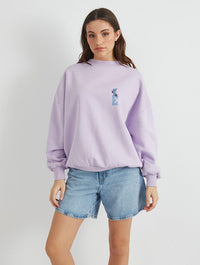 Disney Eeyore Varsity Sweatshirt In Lilac Hoodies & Sweatshirts Skinnydip London