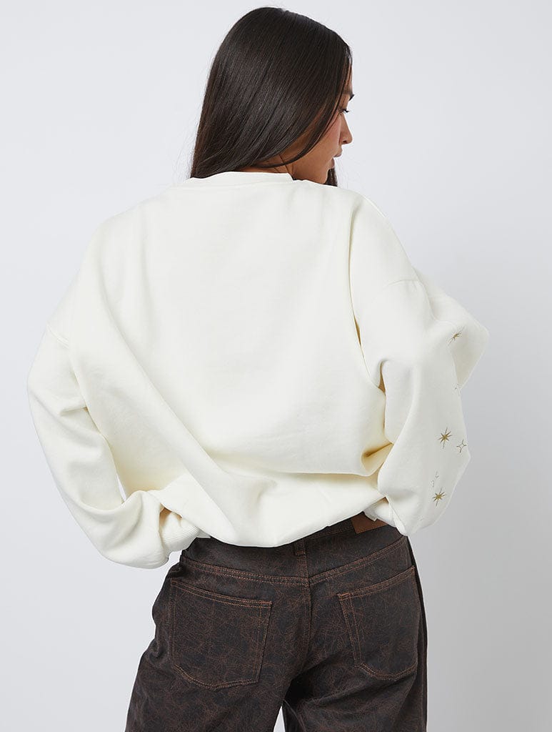 Disney Living in A Fantasy Gold Embroidered Sweatshirt Hoodies & Sweatshirts Skinnydip London