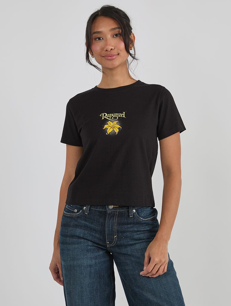 Disney Tangled Glowing Flower Baby T-Shirt In Black Tops & T-Shirts Skinnydip London