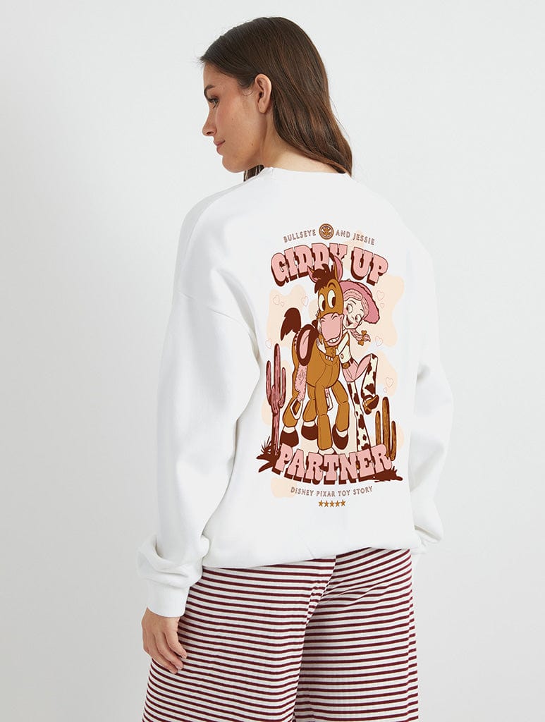 Disney Toy Story Jessie and Bullseye Giddy Up Sweatshirt In White Hoodies & Sweatshirts Skinnydip London