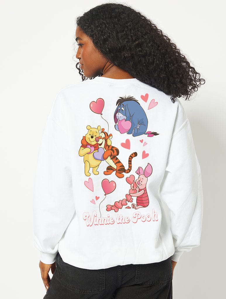 Disney Valentine’s Winnie the Pooh Sweatshirt in White Hoodies & Sweatshirts Skinnydip London