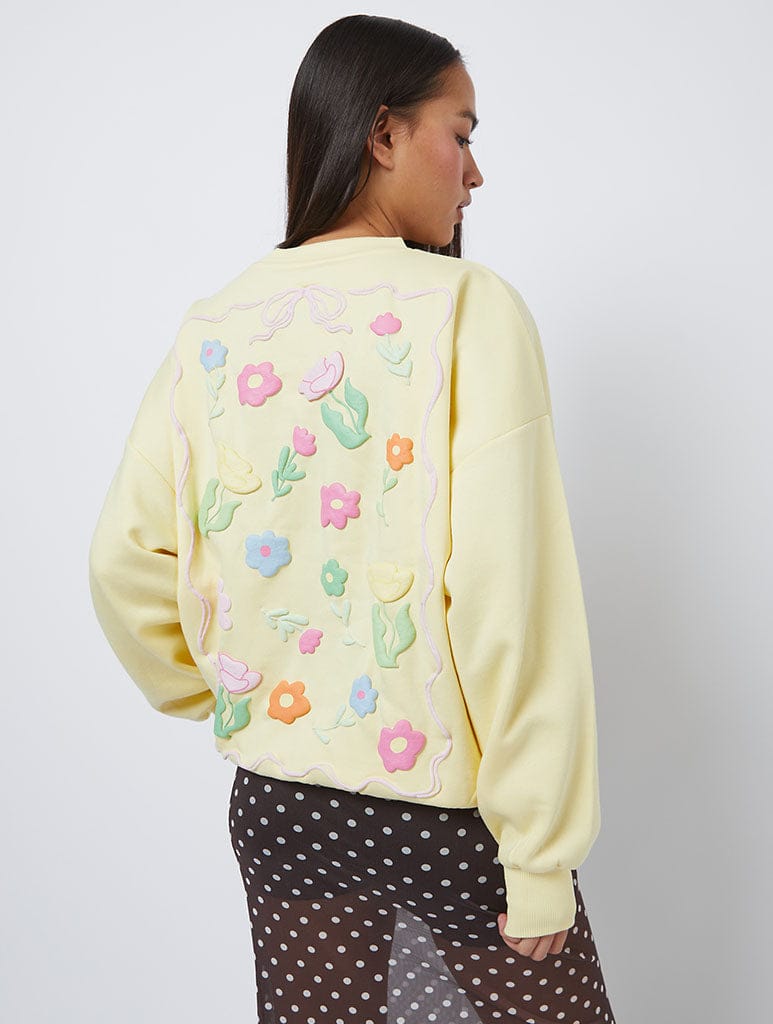 Flora Sweatshirt in Yellow Hoodies & Sweatshirts Skinnydip London