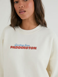 Paddington x Skinnydip Seaside Postcard Sweatshirt In White Hoodies & Sweatshirts Skinnydip London