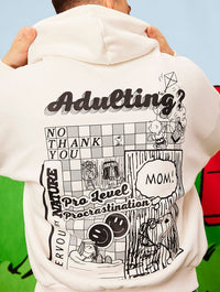 Peanuts x Skinnydip Snoopy Adulting Hoodie in Ecru Hoodies & Sweatshirts Skinnydip London
