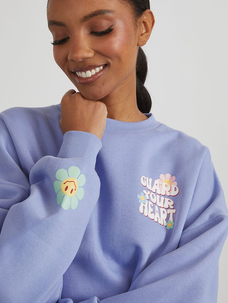 Protect Your Love Sweatshirt in Blue Hoodies & Sweatshirts Skinnydip London