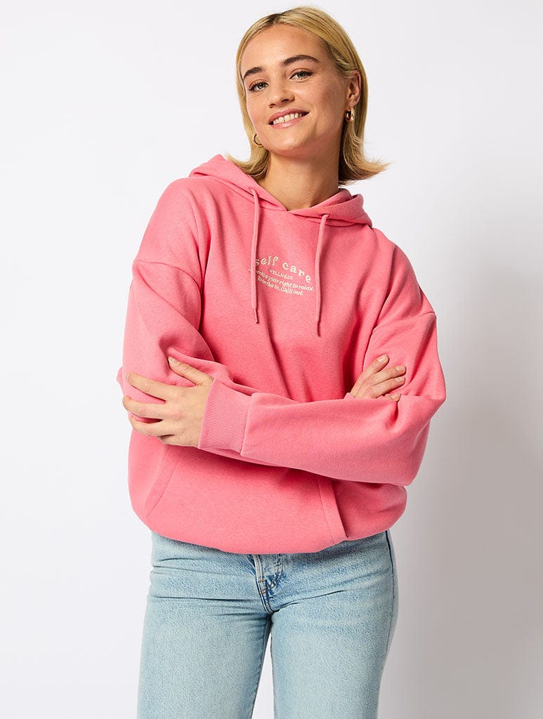 Wellness Hoodie in Pink Hoodies & Sweatshirts Skinnydip London