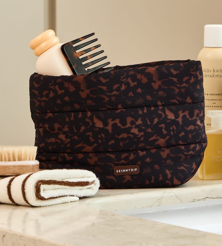 Dark tortoiseshell cosmetic bag