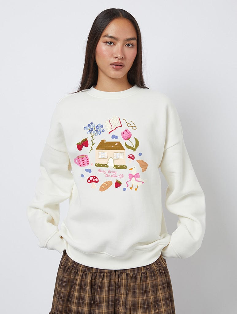 Busy Living The Slow Life Sweatshirt In White Hoodies & Sweatshirts Skinnydip London