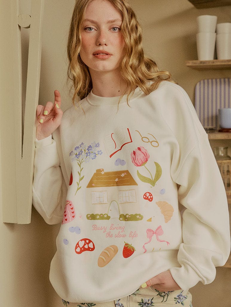 Busy Living The Slow Life Sweatshirt In White Hoodies & Sweatshirts Skinnydip London