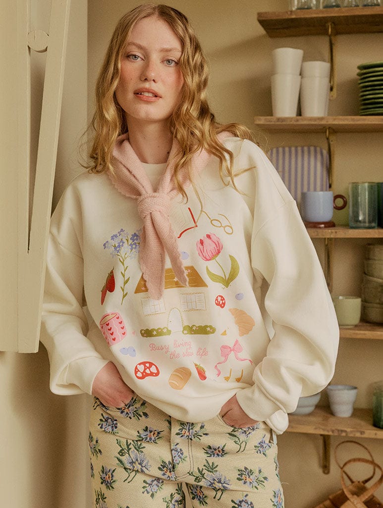 Busy Living The Slow Life Sweatshirt In White Hoodies & Sweatshirts Skinnydip London