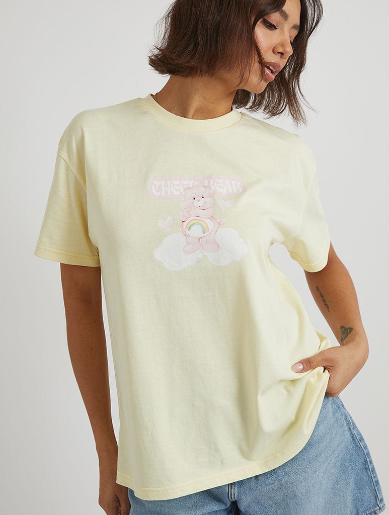 Care Bears x Skinnydip Cheer Bear T-Shirt in Yellow Tops & T-Shirts Skinnydip London