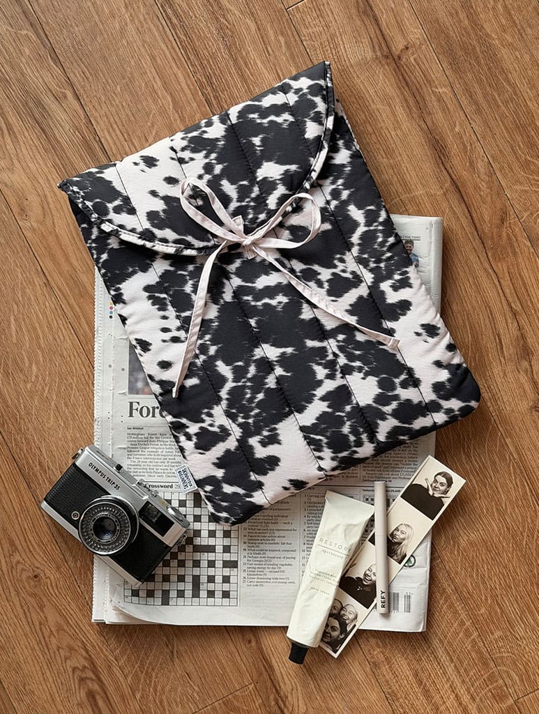 Cow Print Quilted Bow Laptop Sleeve Laptop Cases Skinnydip London