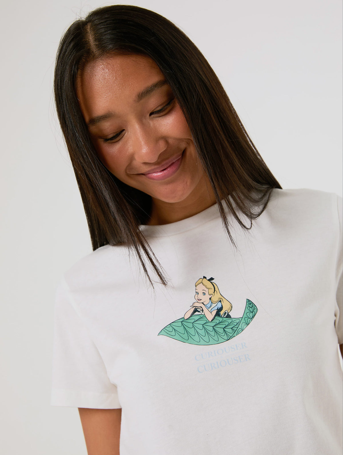Disney Alice In Wonderland Curiouser and Curiouser Baby T-Shirt In White Tops & T-Shirts Skinnydip London