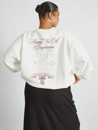 Disney Living In A Daydream Sweatshirt in Ecru Hoodies & Sweatshirts Skinnydip London