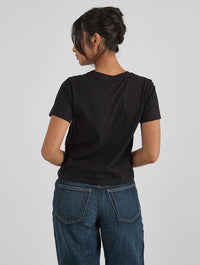 Disney Tangled Glowing Flower Baby T-Shirt In Black Tops & T-Shirts Skinnydip London