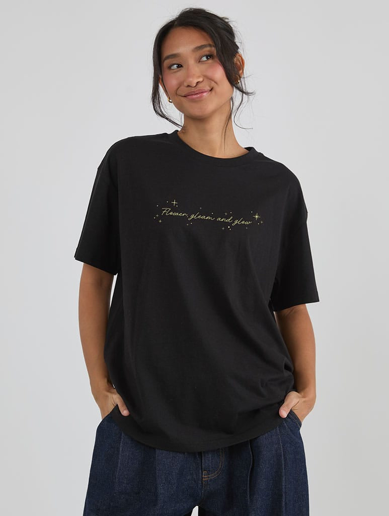 Disney Tangled Glowing Flower T-Shirt In Black Tops & T-Shirts Skinnydip London