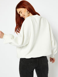 Disney Vintage Style Stitch Graphic Oversized Sweatshirt In Cream Hoodies & Sweatshirts Skinnydip London