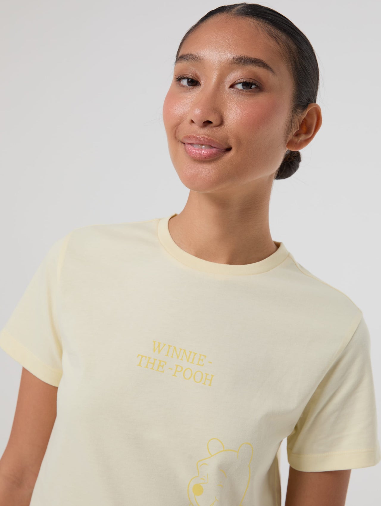Disney Winnie The Pooh Baby T-Shirt In Butter Yellow Tops & T-Shirts Skinnydip London