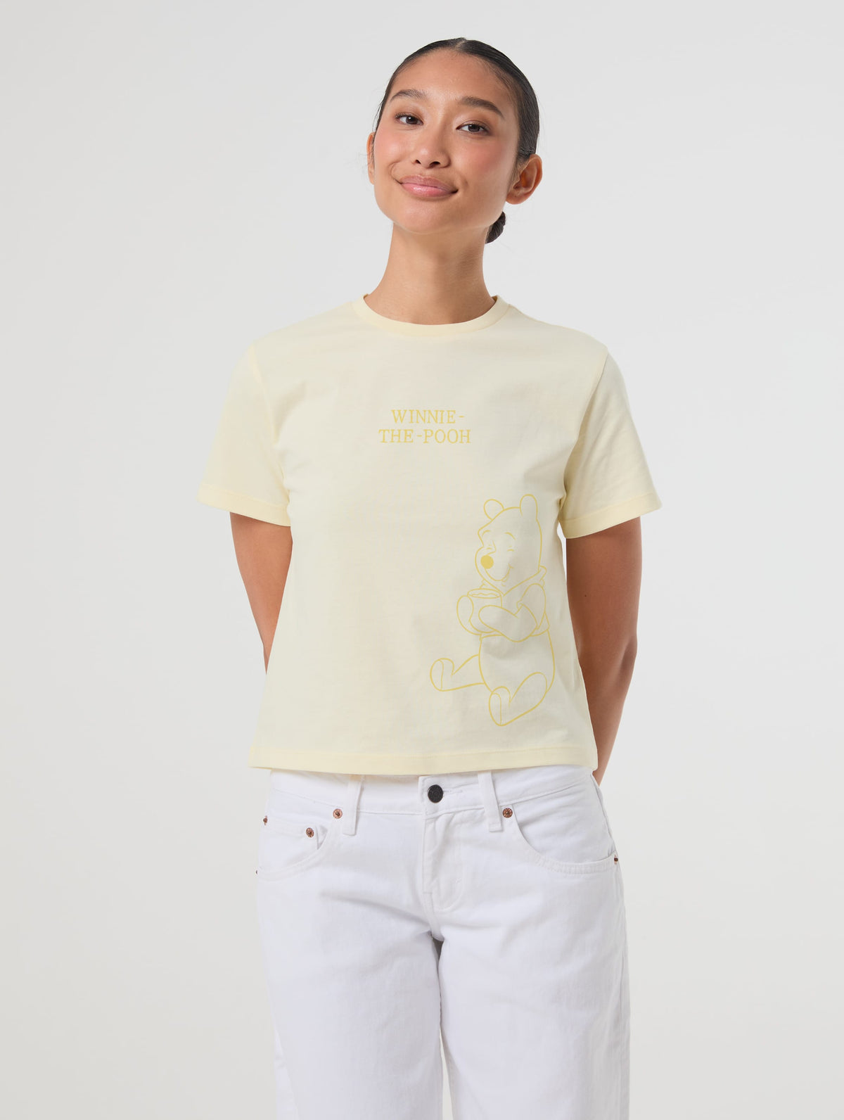 Disney Winnie The Pooh Baby T-Shirt In Butter Yellow Tops & T-Shirts Skinnydip London