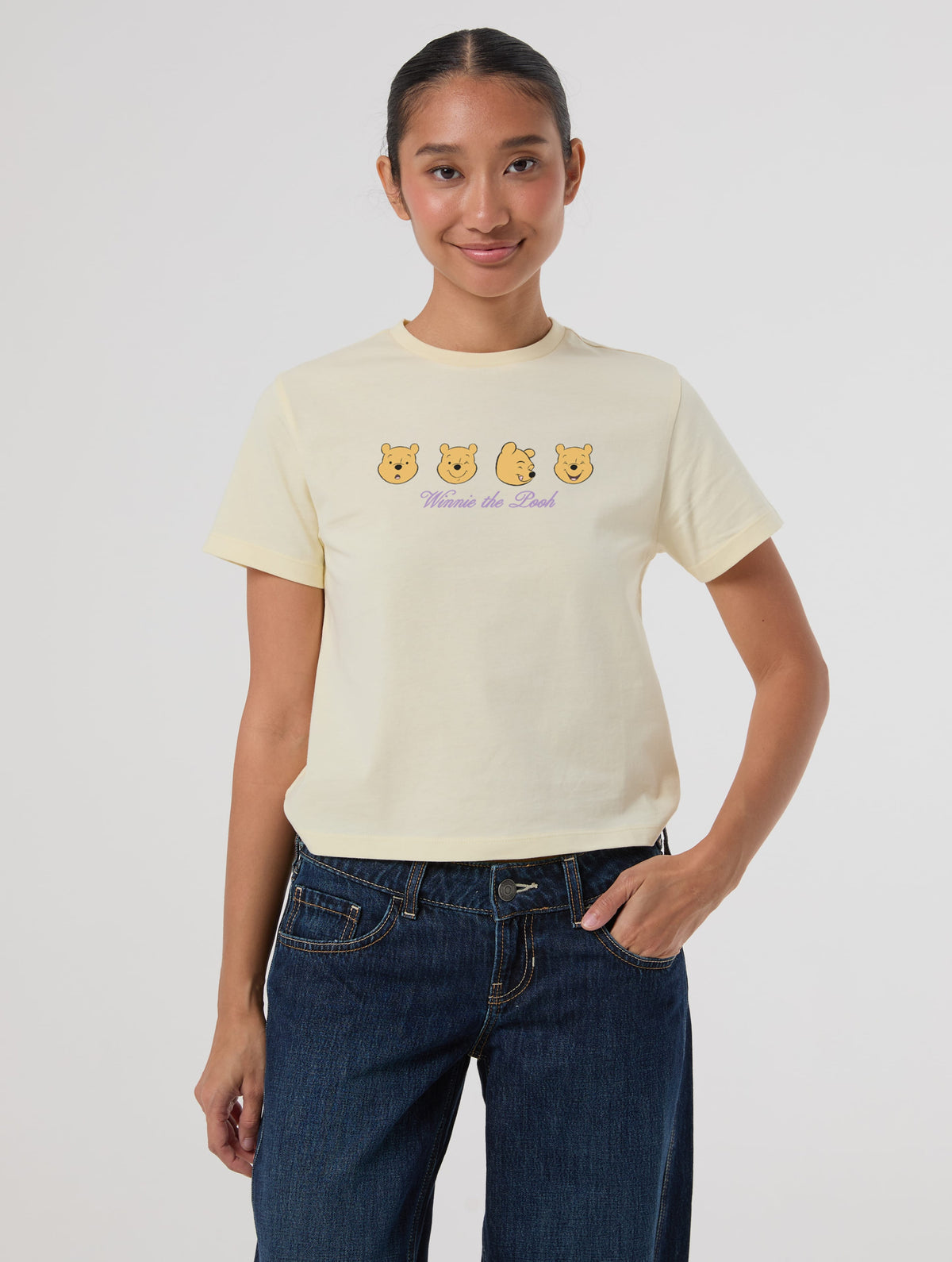 Disney Winnie The Pooh Faces Baby T-Shirt In Butter Yellow Tops & T-Shirts Skinnydip London