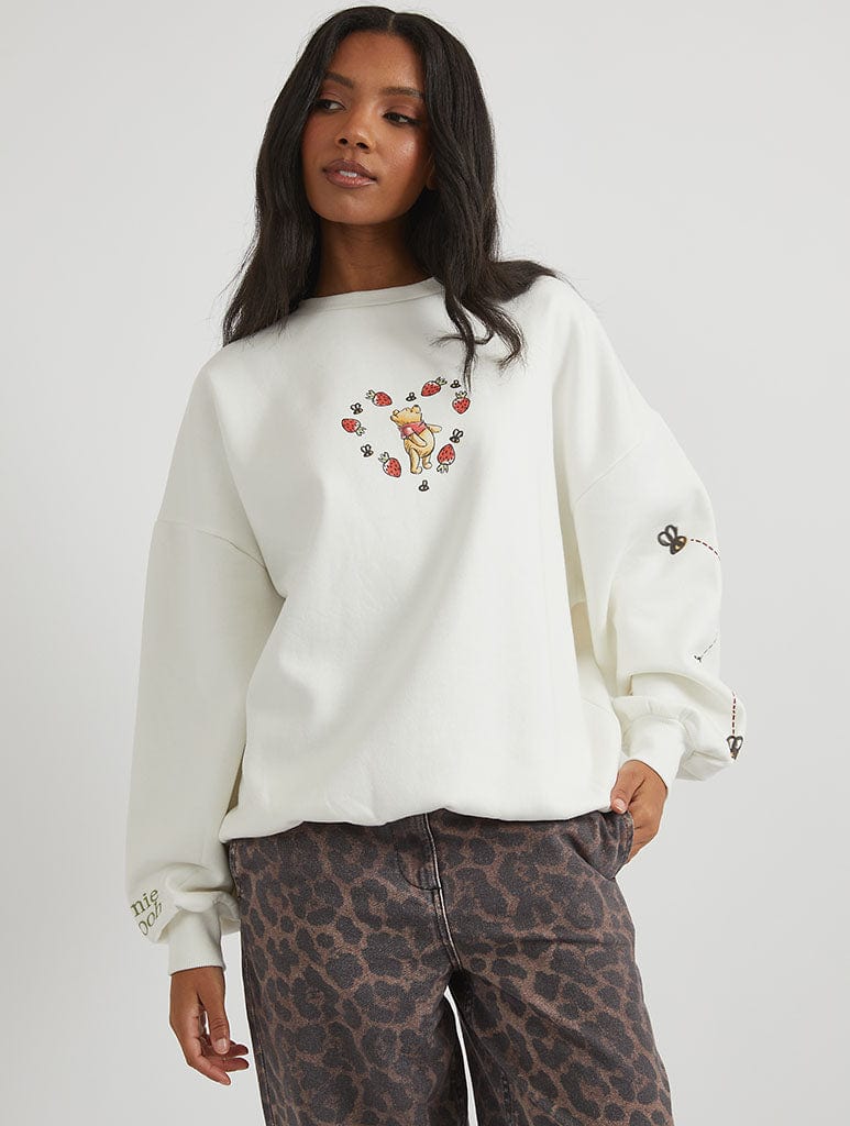 Disney Winnie The Pooh Strawberry Sweatshirt in Ecru Hoodies & Sweatshirts Skinnydip London