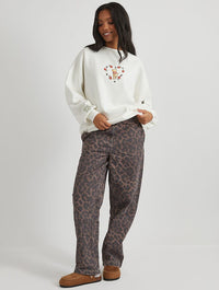 Disney Winnie The Pooh Strawberry Sweatshirt in Ecru Hoodies & Sweatshirts Skinnydip London