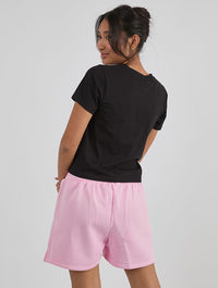 Do You Love Me Or Not Baby T-Shirt In Black Tops & T-Shirts Skinnydip London