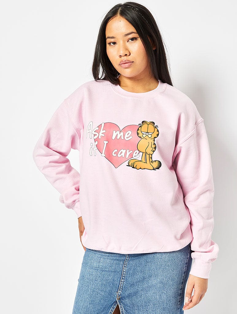 Garfield x Skinnydip Ask Me If I Care Sweatshirt in Pink Hoodies & Sweatshirts Skinnydip London