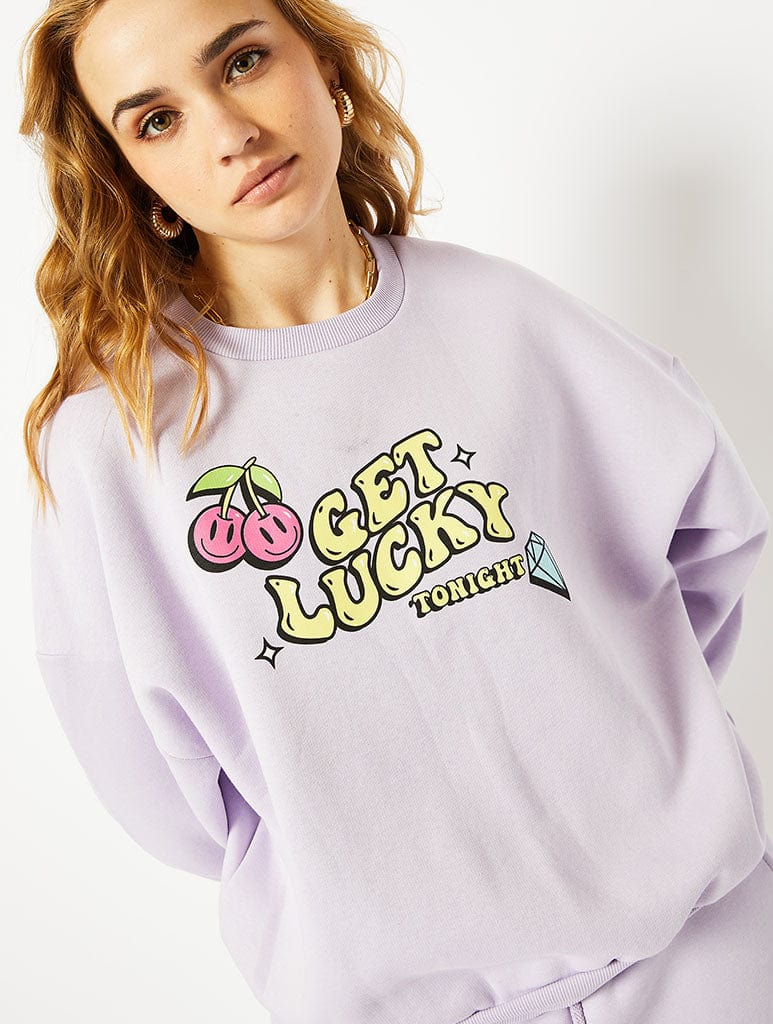 Get Lucky Oversized Sweatshirt in Purple Hoodies & Sweatshirts Skinnydip London
