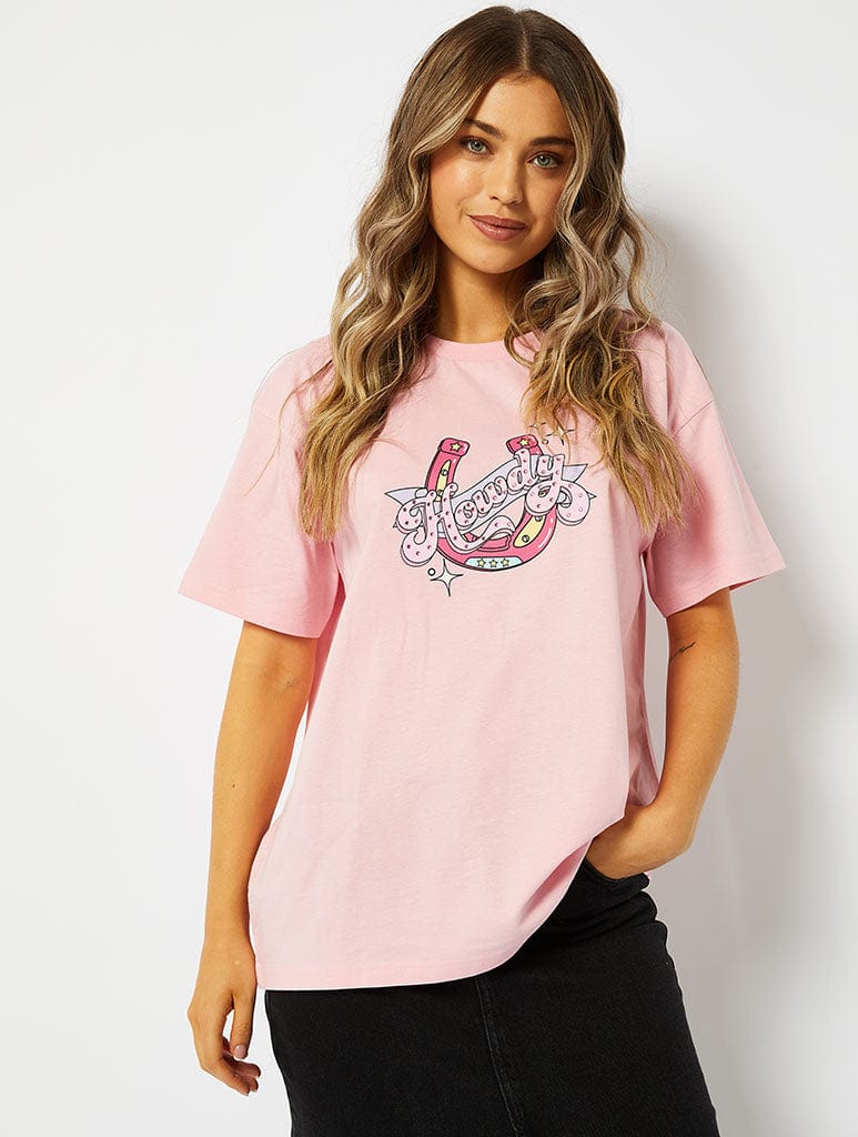 Howdy Graphic Oversized T-Shirt in Pink Tops & T-Shirts Skinnydip London