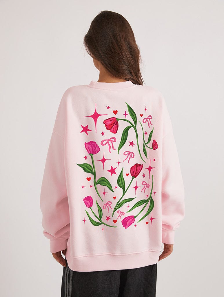Love Grows Here Sweatshirt In Pink Hoodies & Sweatshirts Skinnydip London
