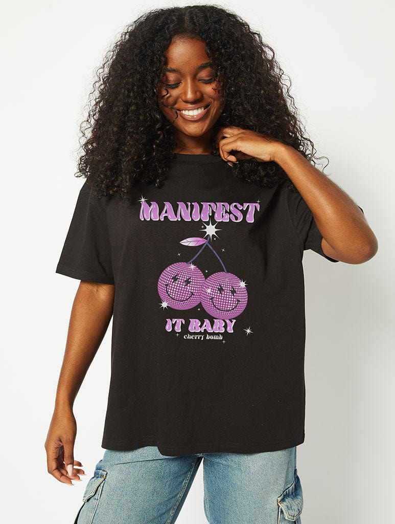 Manifest it Baby T-Shirt in Black Tops & T-Shirts Skinnydip London