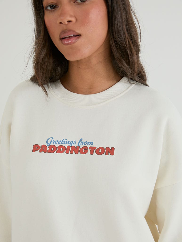 Paddington x Skinnydip Seaside Postcard Sweatshirt In White Hoodies & Sweatshirts Skinnydip London