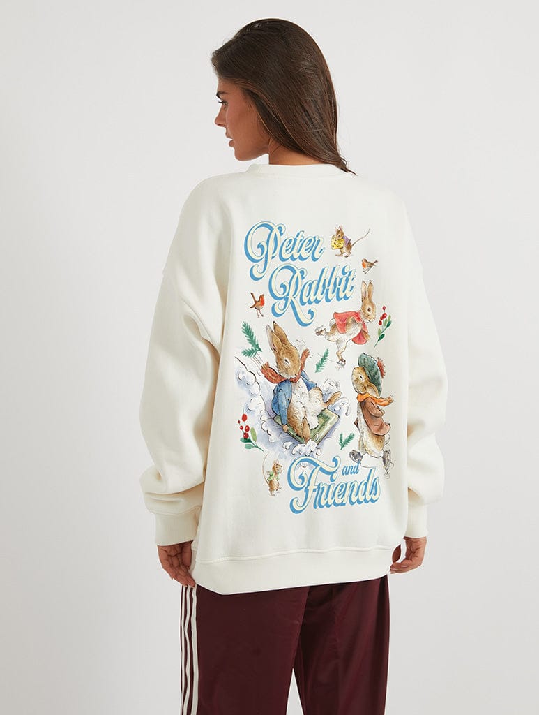 Peter Rabbit x Skinnydip Winter Adventure Sweatshirt In White Hoodies & Sweatshirts Skinnydip London