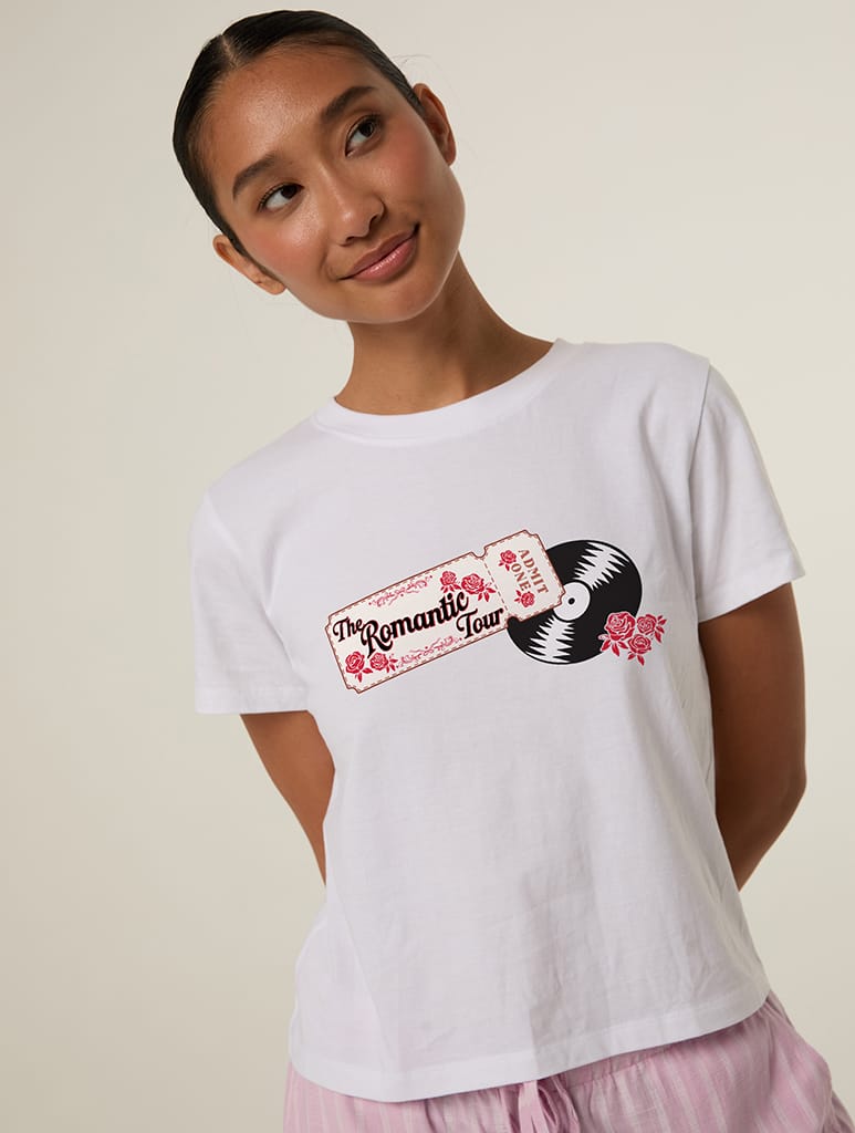 The Romantic Tour Ticket Baby T-Shirt In White Tops & T-Shirts Skinnydip London