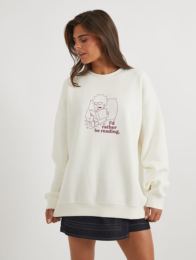 The Simpsons x Skinnydip Lisa Reading Sweatshirt In White Hoodies & Sweatshirts Skinnydip London