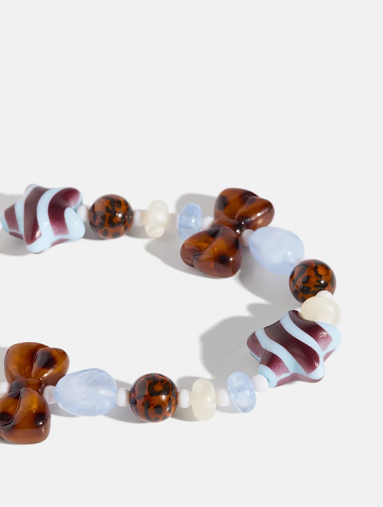 Tortoiseshell Stripe Bows Beaded Strap in Blue Phone Grips Skinnydip London