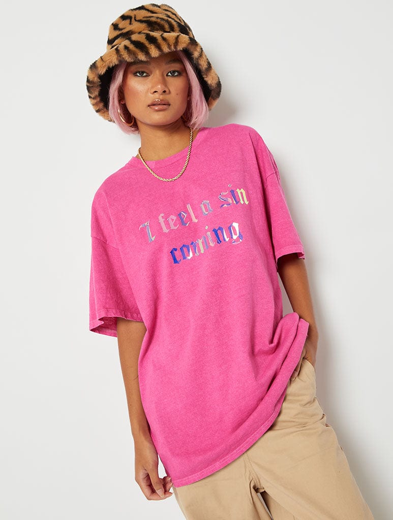 I Feel a Sin Coming Slogan Oversized T-Shirt in Pink Tops & T-Shirts Skinnydip London